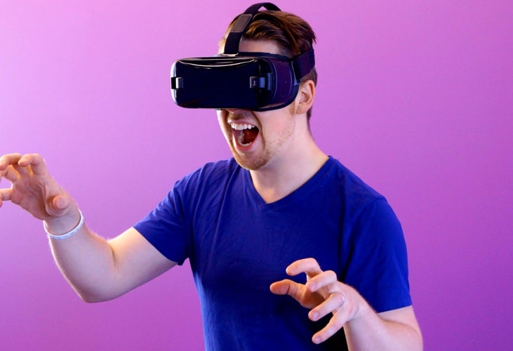 A man playing witha VR Headset