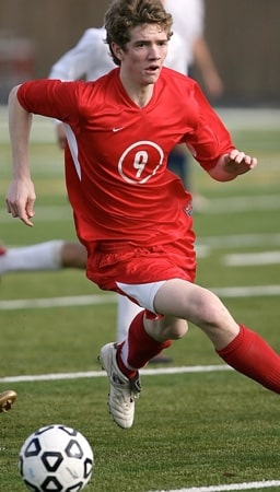 Man in a jersey playing soccer